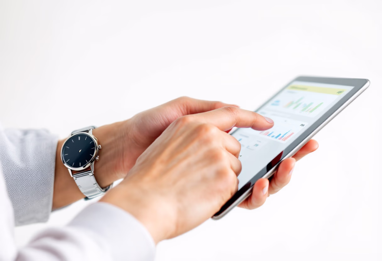 image of hands booking a garment care session on a tablet, close-up.