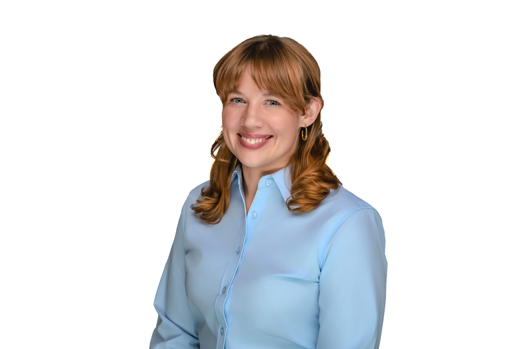 Photo of a young woman with strawberry-blonde hair and a light blue dress shirt