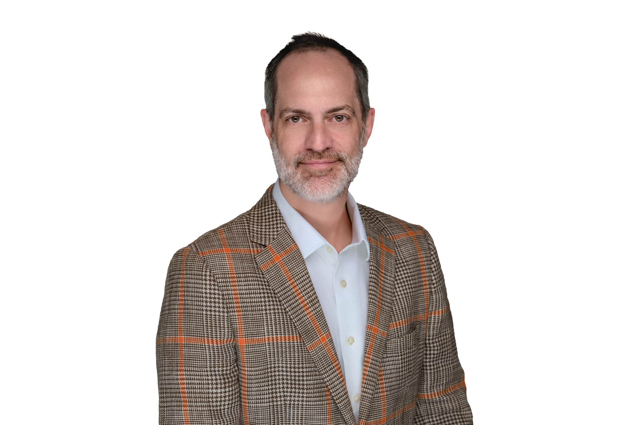 Photo of a man with dark hair and a grey beard in a brown and orange tweed suit and white shirt