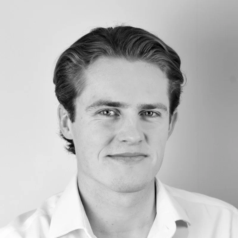 Black and white headshot of Theo, Lava Labs CEO supporting reusable cup cleaning and sustainable missions.