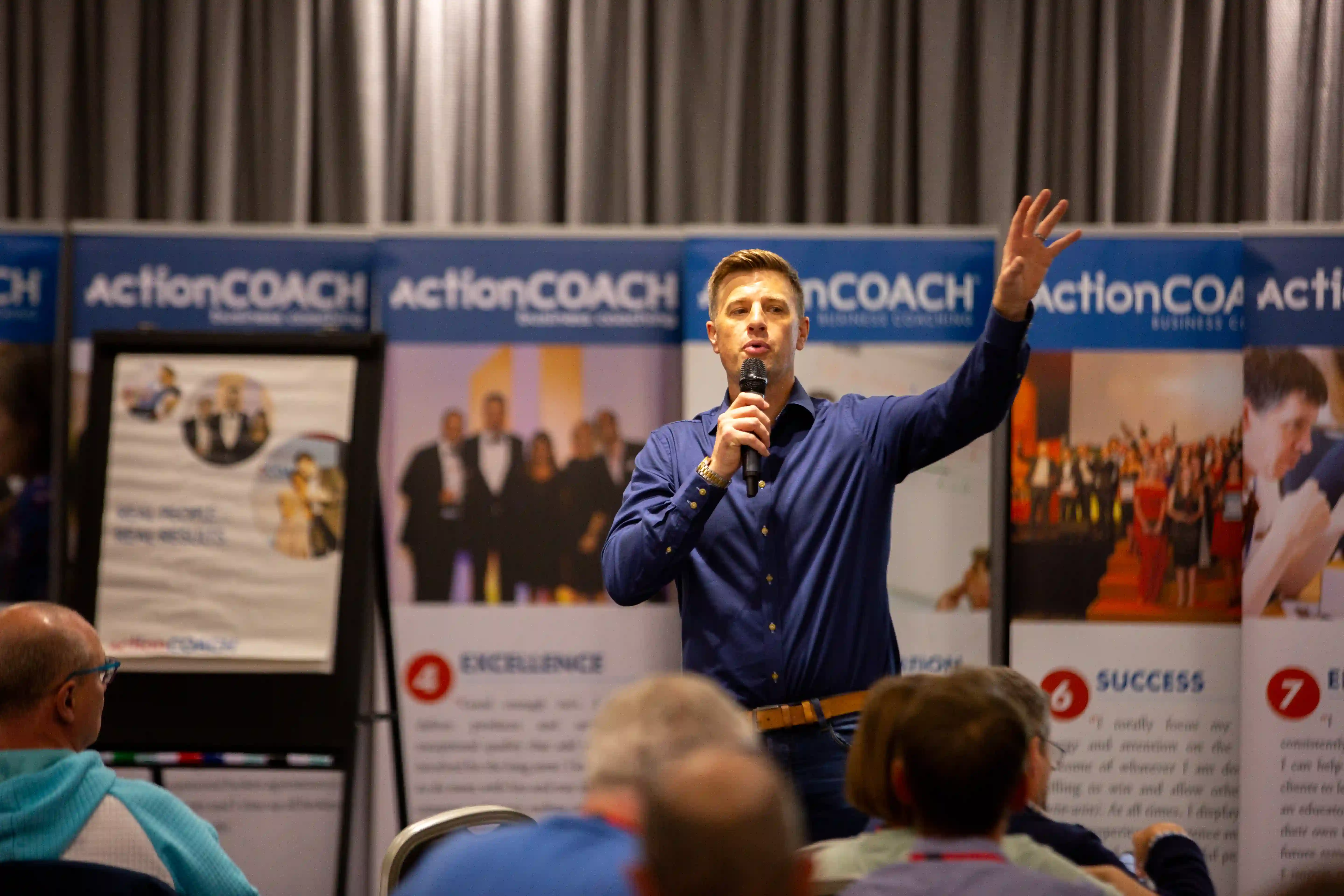 James Vincent speaks at a Action Coach workshop.
