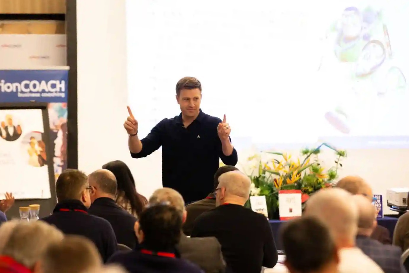 James Vincent at a speaking event for ActionCOACH
