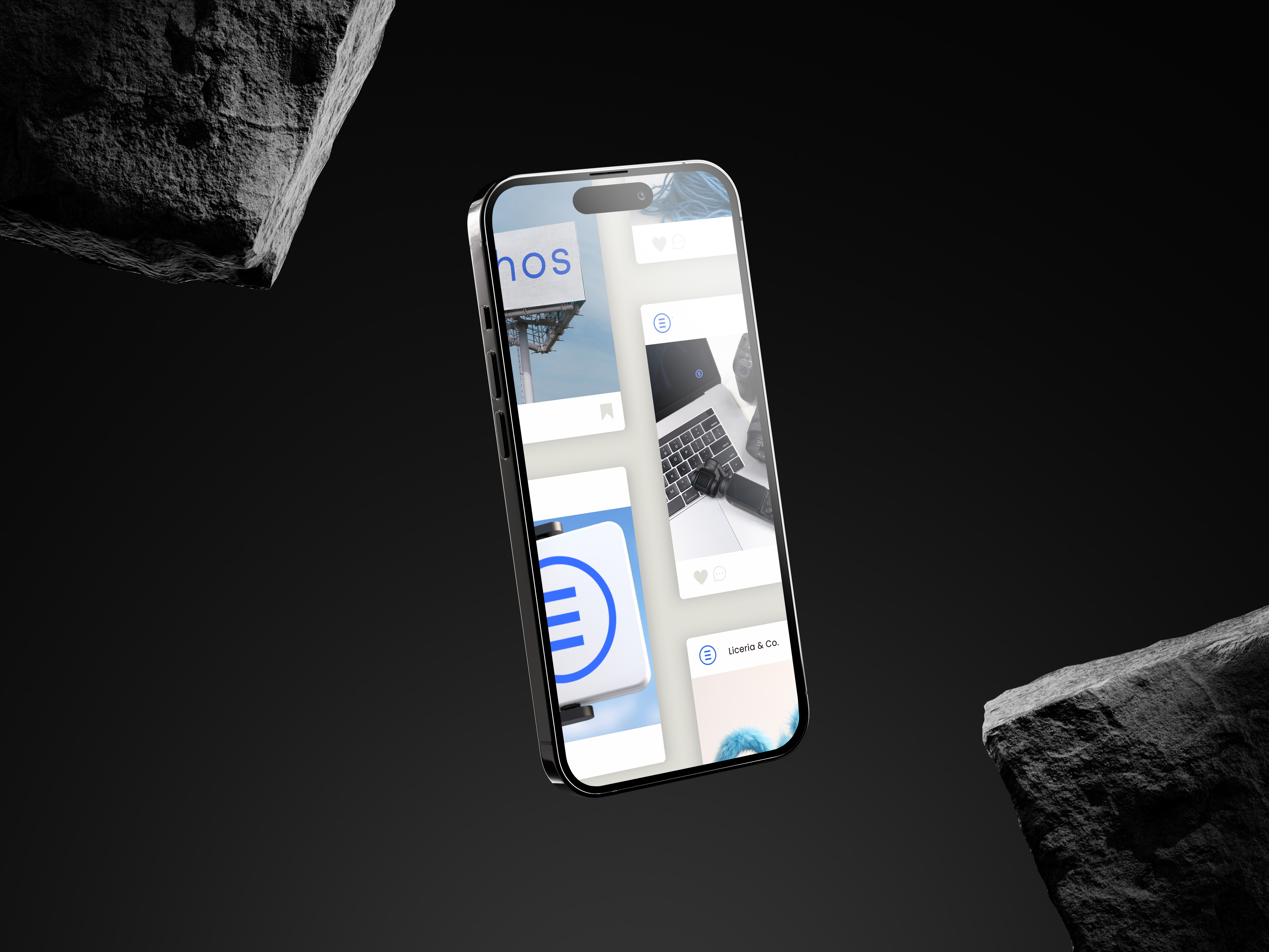 An iPhone floating between two black rocks displaying some Social Media content.