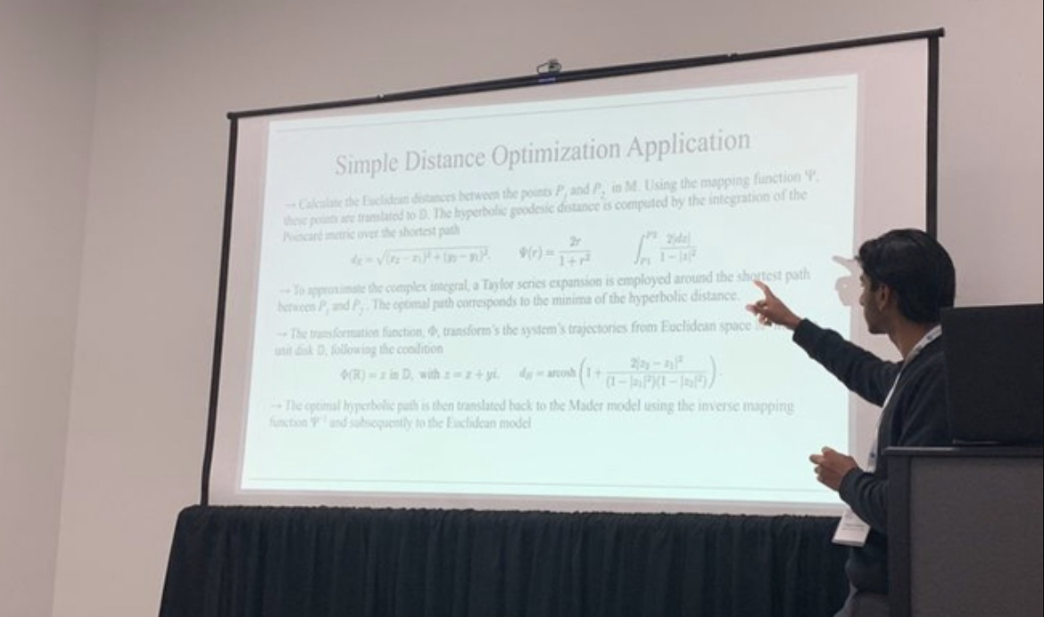 An Echelon Scholars mentor presenting research at a conference session