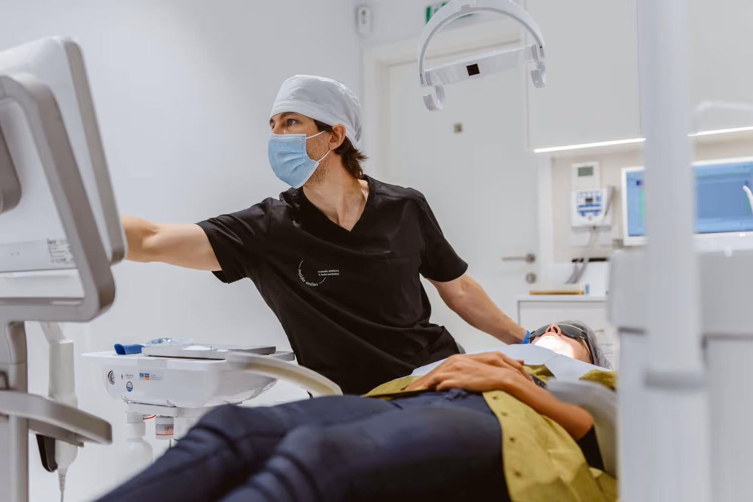 photo of dr pedro and patient