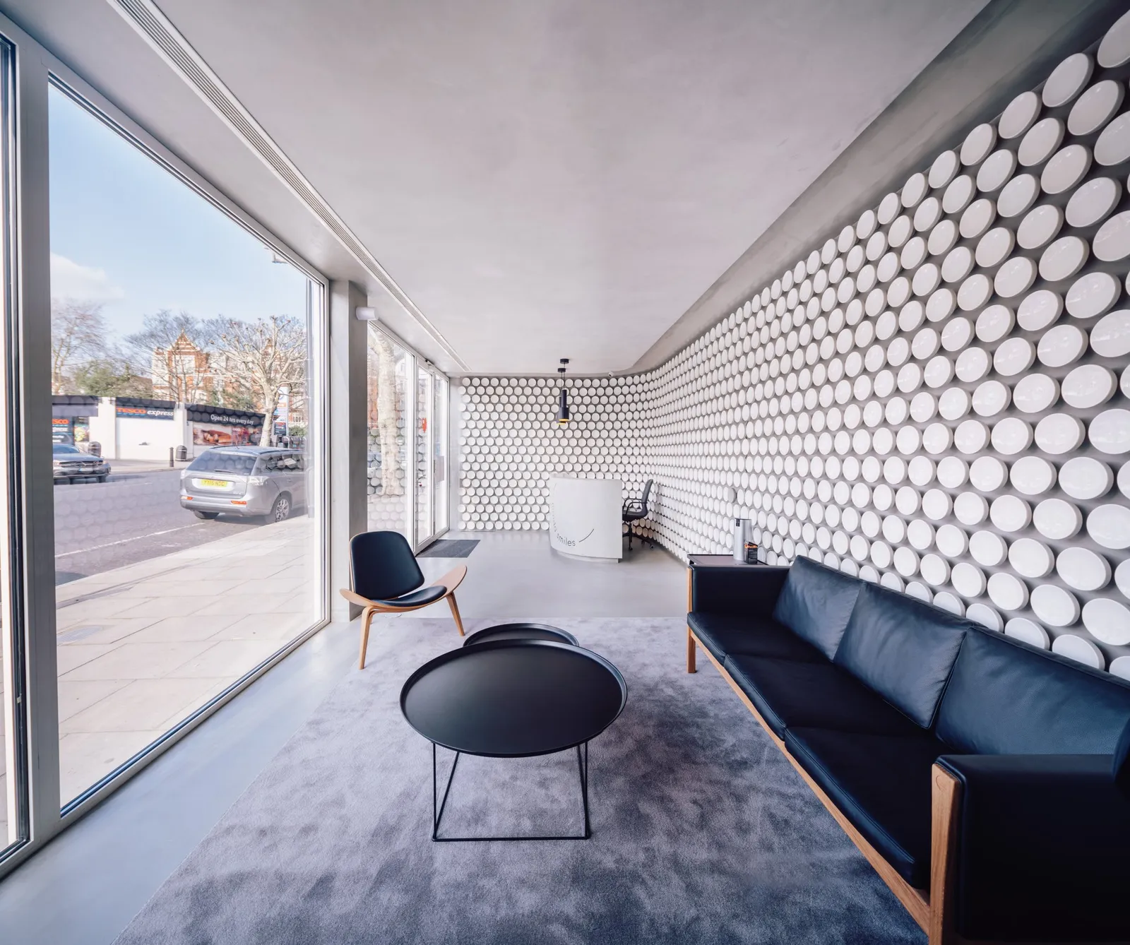 Waiting area at Maida Smiles with a view of the street