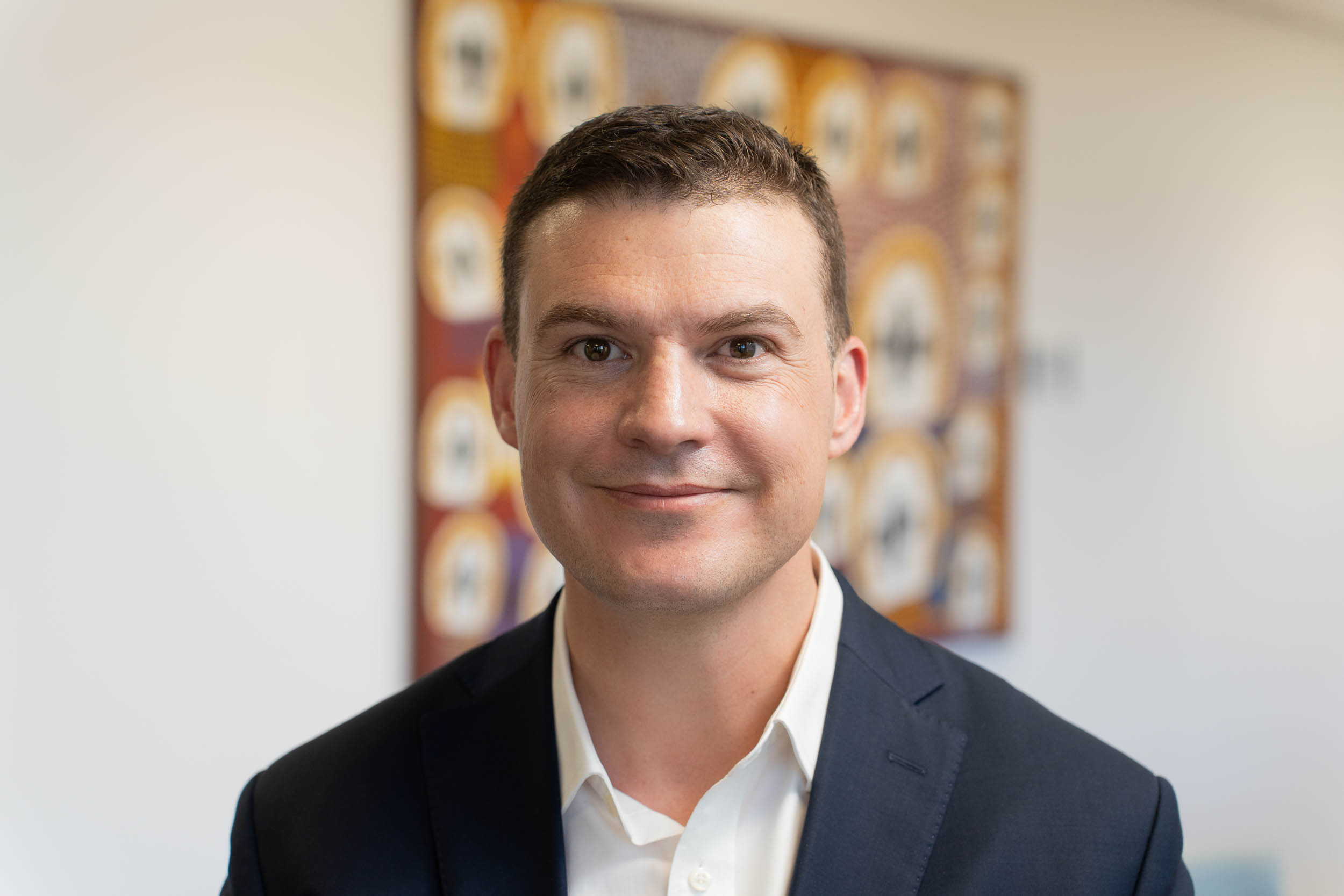 [headshot] image of a smiling customer (for a travel agency)