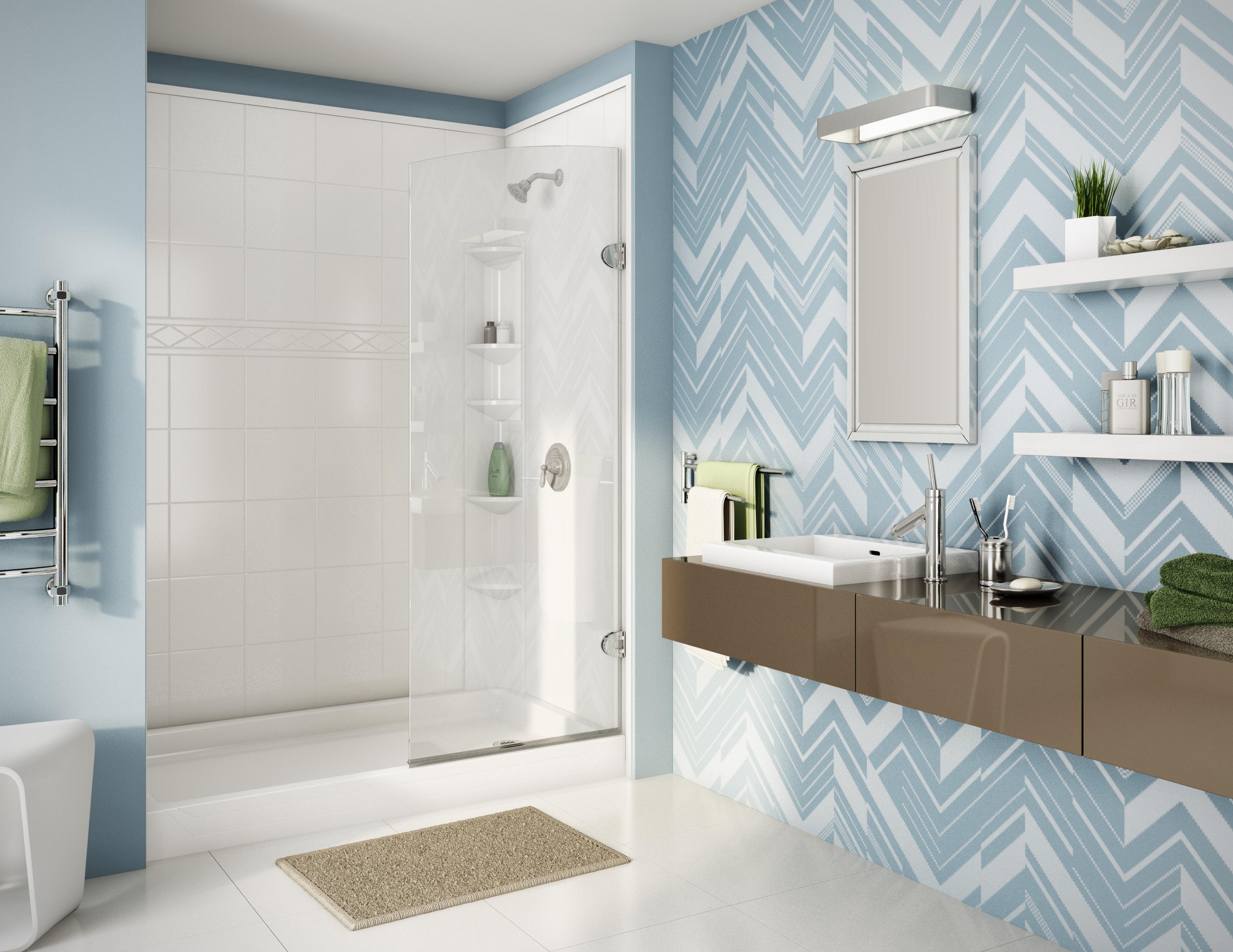 Modern bathroom with a walk-in shower featuring a glass door and built-in corner shelves. The room includes a floating brown vanity with a white vessel sink, contemporary fixtures, and a bold blue-and-white chevron-patterned accent wall. A beige rug lies on the sleek white tile floor.