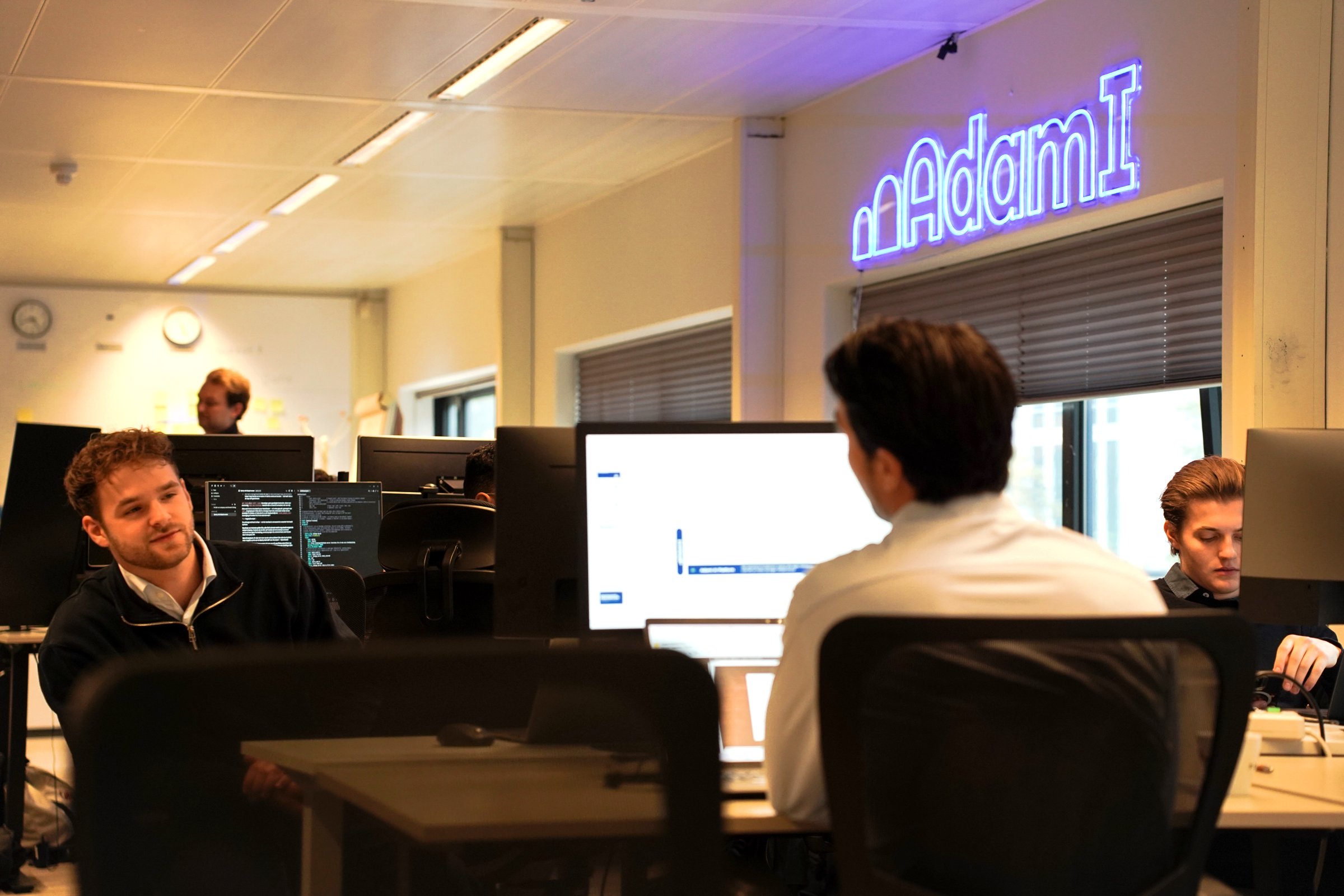 AdamI team at work in the office
