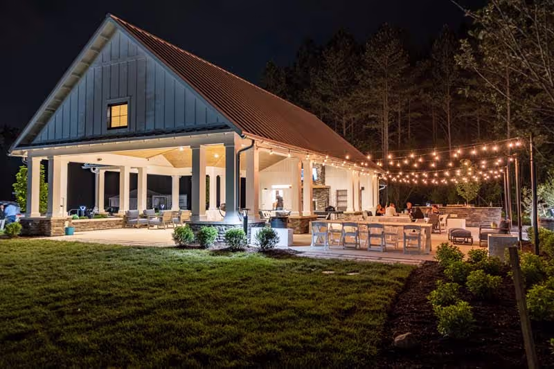 HHHunt Awarded Developer - Residents enjoying the River Mill pavilion at night