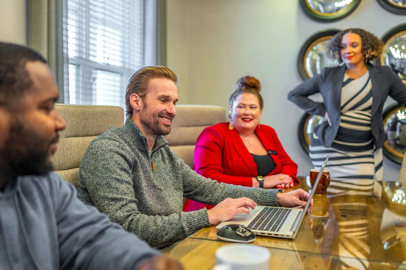 HHHunt employees sitting around a conference table