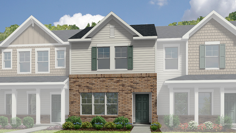 Exterior of a brown and tan townhouse shaded for emphasis.