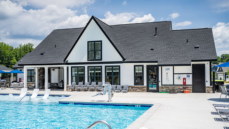 Relaxing pool and seating at Enclave at Leesville