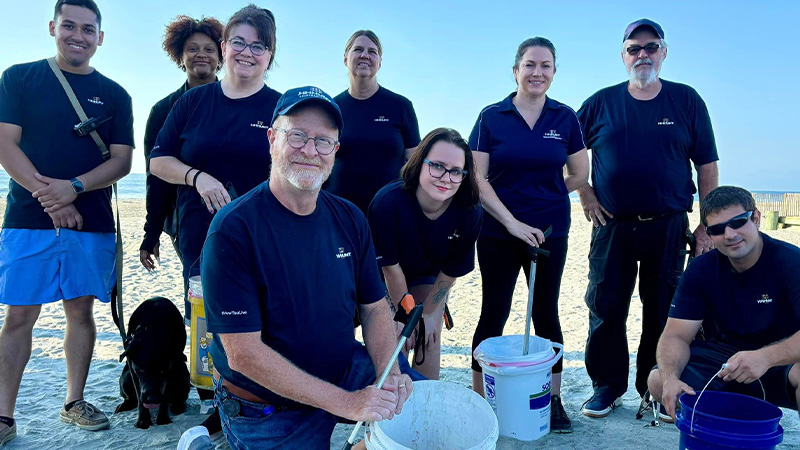 People standing taking a photograph