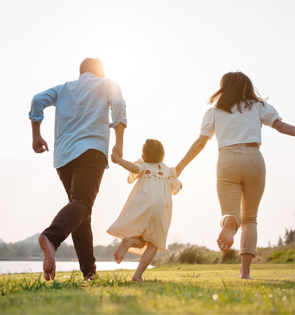family running in a field