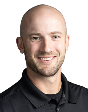 Smiling bald man in black shirt against white background