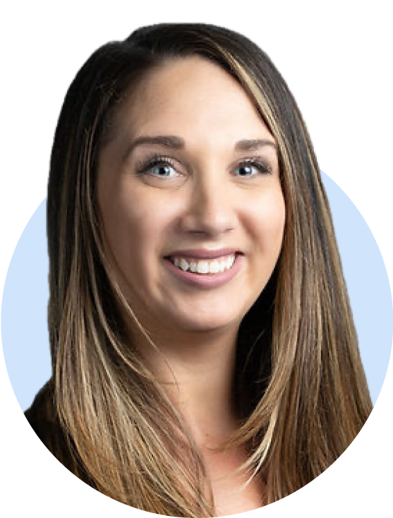 Smiling professional headshot of a woman with long brown hair