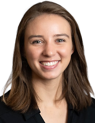 Smiling professional woman in black shirt with company logo