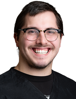 Smiling person in glasses wearing black Kooten shirt