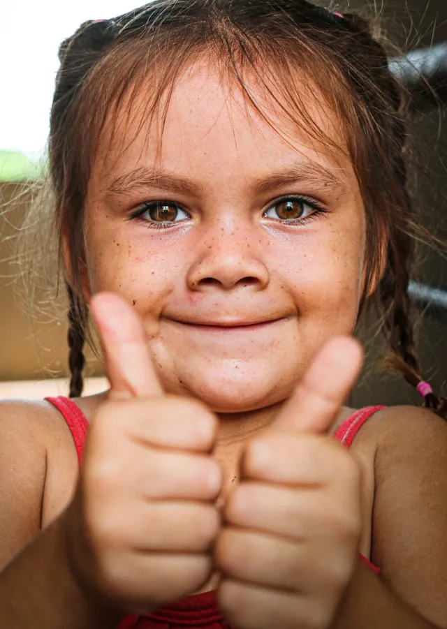 Happy kid with two thumbs up. Together under one roof is a family friendly home show for Mandeville, Covington, Abita Springs, Madisonville, and surrounding areas.