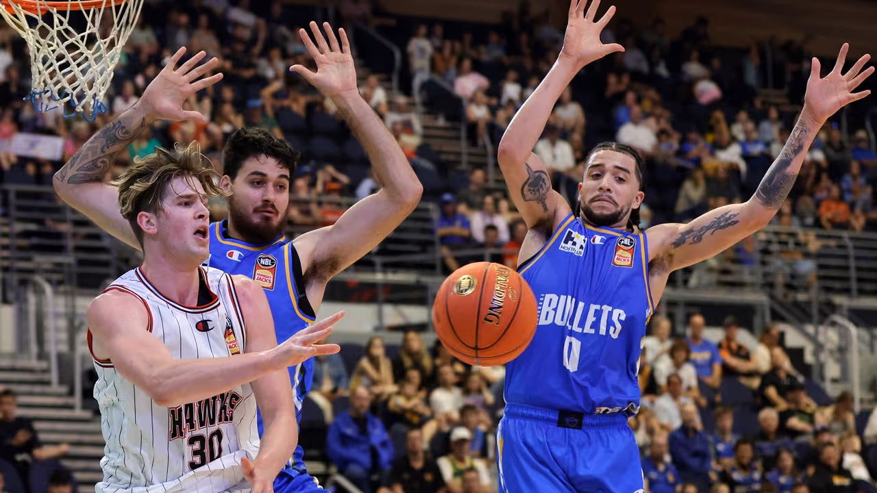 Hawks beat Bullets as Olbrich shines