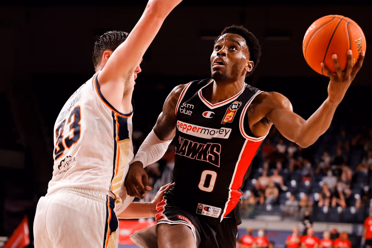 Second-half surge powers Hawks to historic win