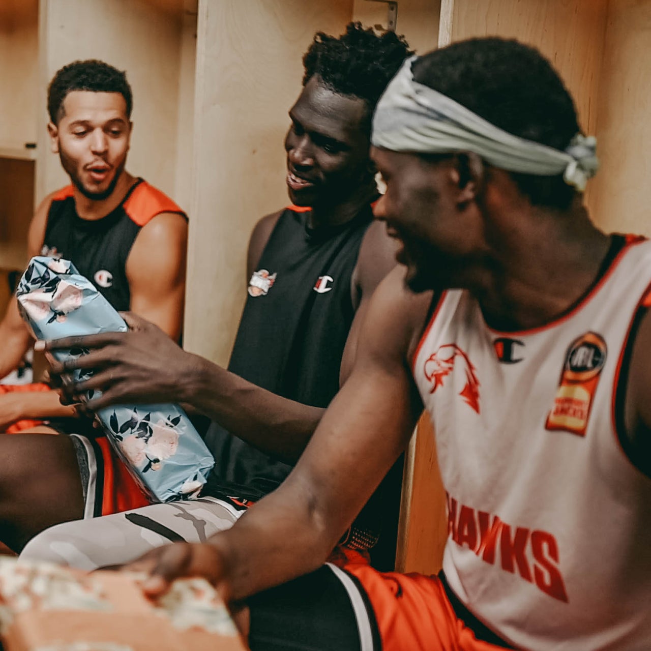 Hawks exchange Secret Santa gifts