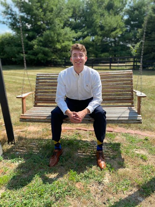 founder sitting on swinging bench