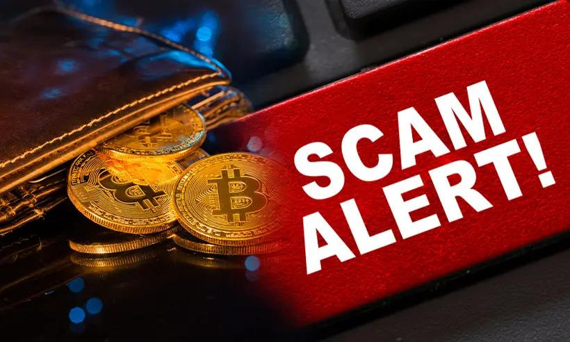 A warning sign reading “Scam Alert” appears next to Bitcoin coins, highlighting rising Social Media Scams involving fake crypto investments and digital wallet fraud..