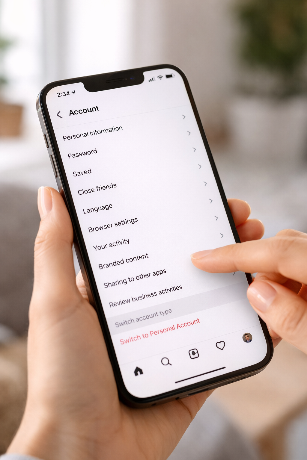 Close-up of tapping switch to personal account option in Instagram settings.