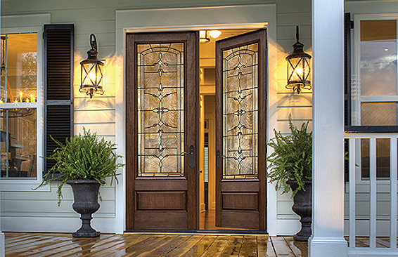 Good looking doors on a front porch of a home.