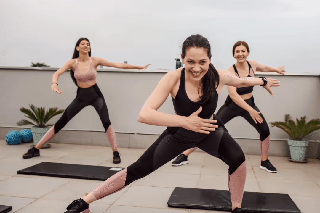 women doing aerobics in a gym space