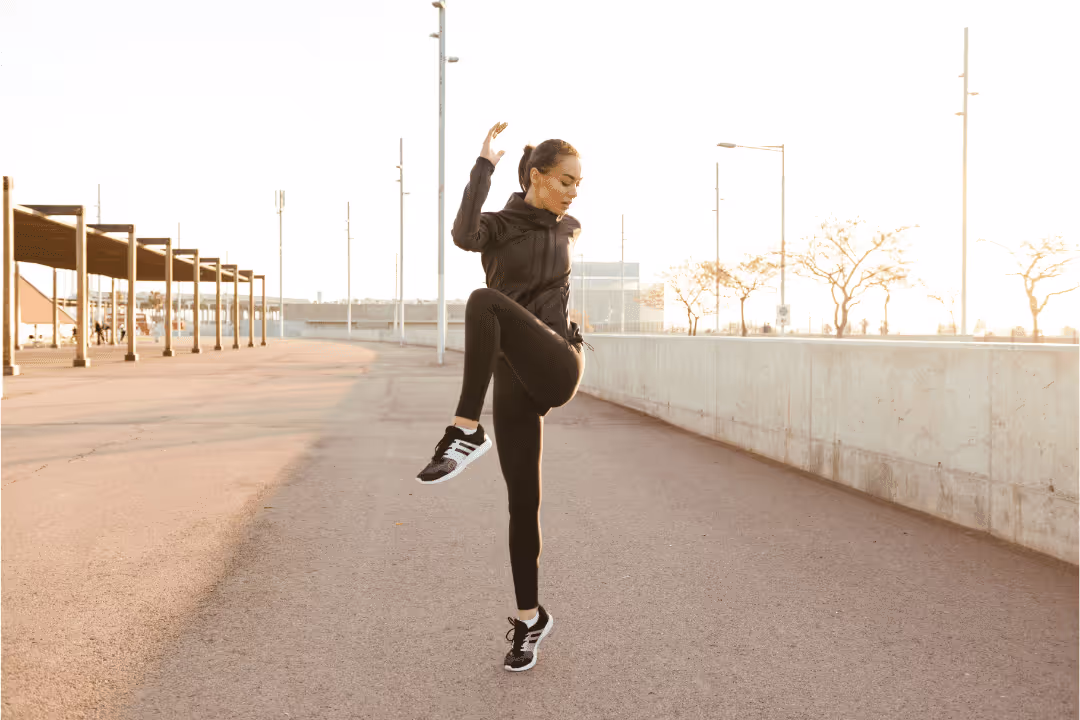 woman exercising interval workout outside winter time