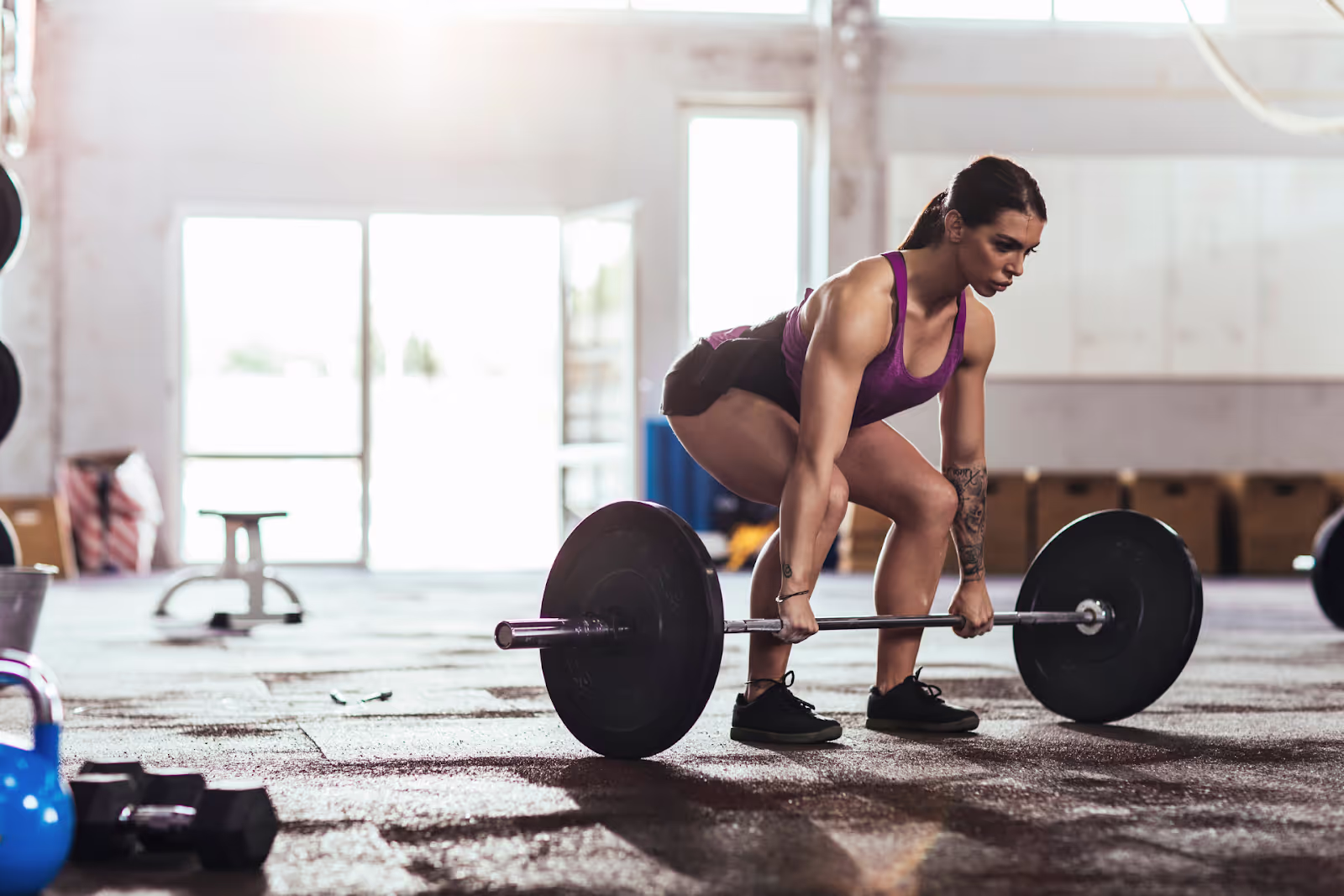 woman performing deadlift