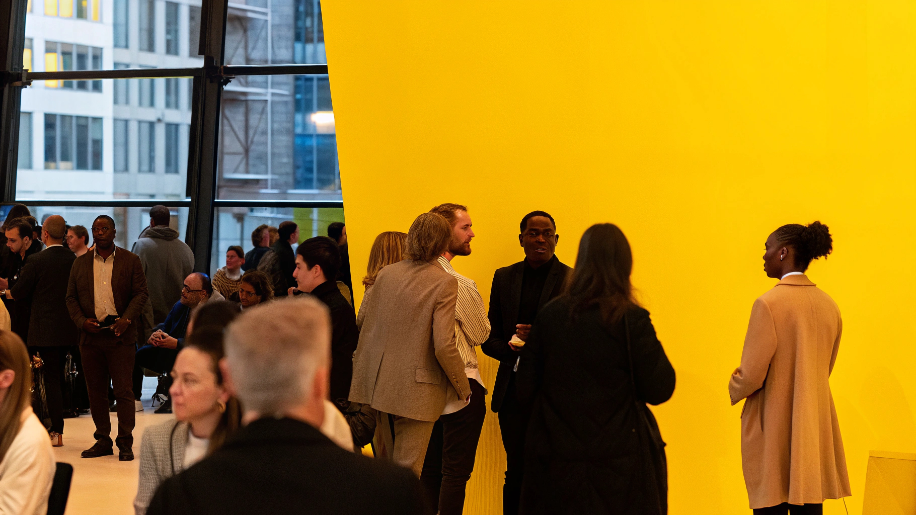 image of students working on a collaborative project in an open courtyard