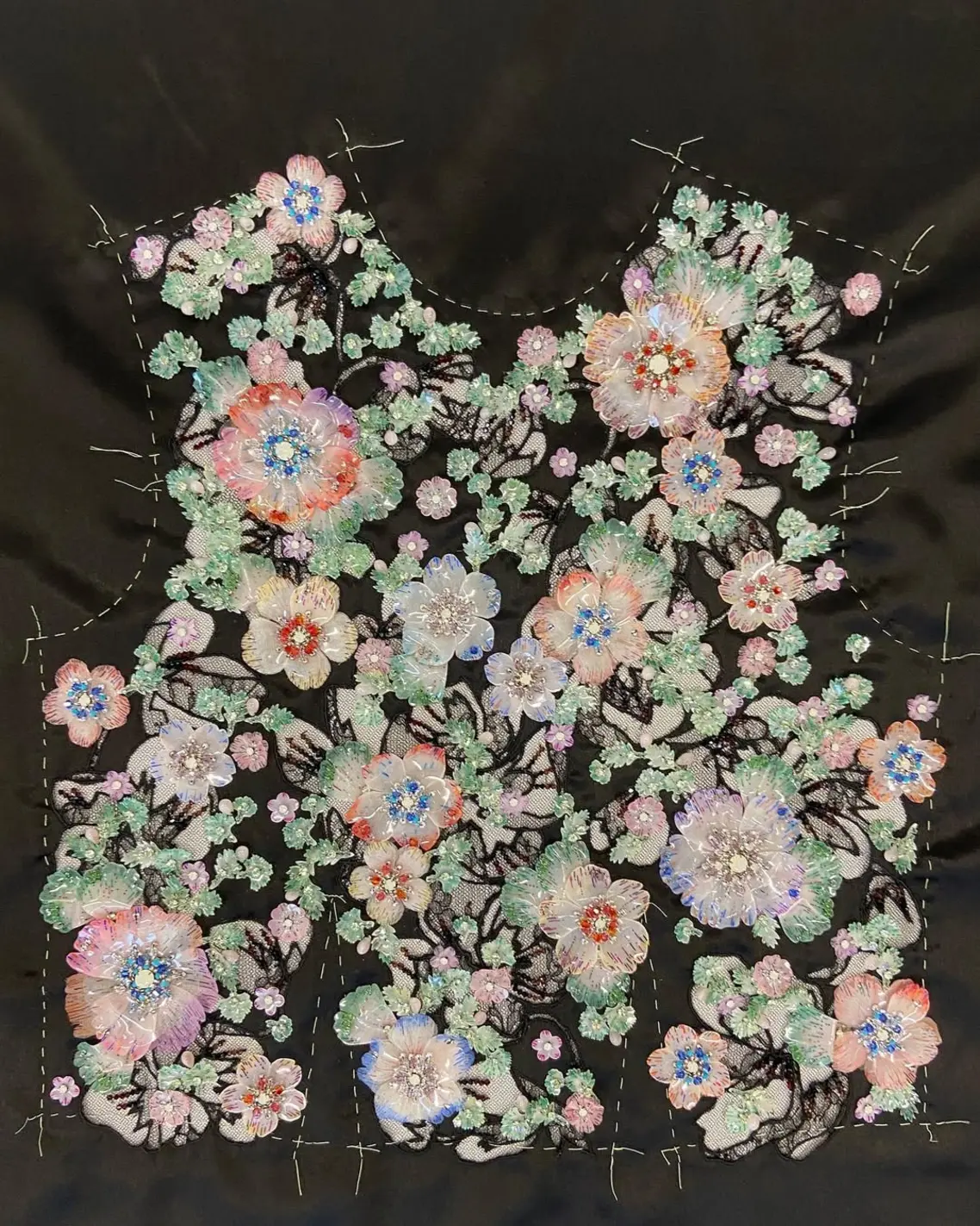 A masterful work by Lemarié, featuring hand-painted flowers and intricately encrusted with over ten thousand pearls