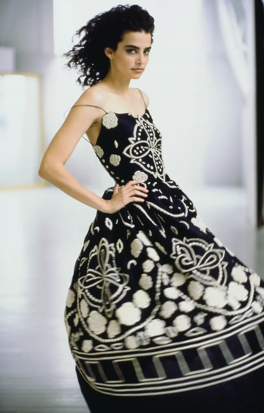 The January 1989 edition of Vogue featured Jennifer Rubin modeling a Giorgio Armani Couture silver-embroidered silk organza camisole and ball skirt