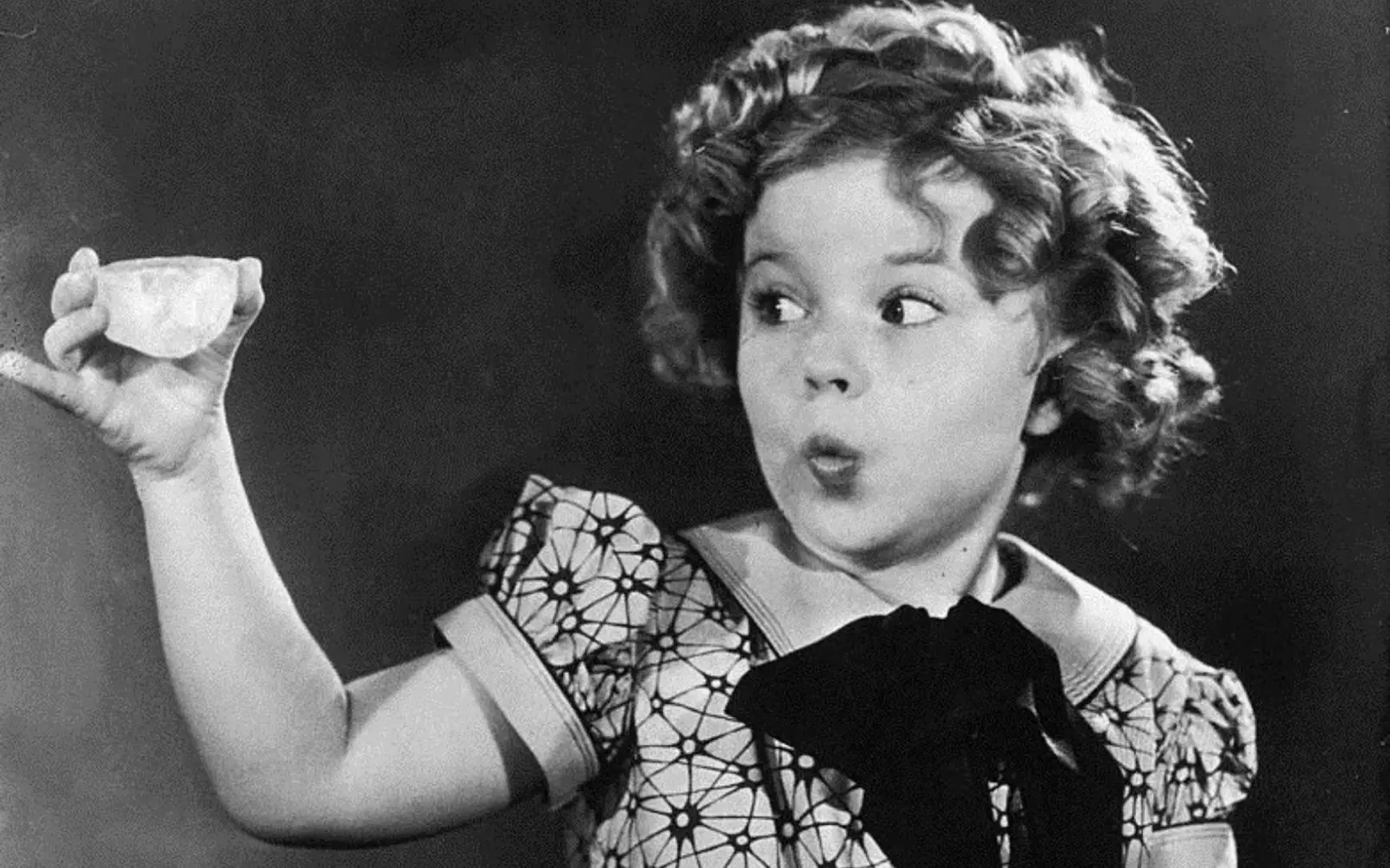 Child star Shirley Temple inspects the Jonker rough