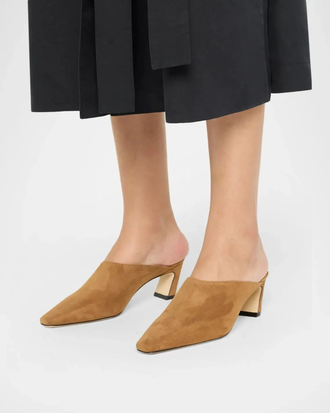 Stuart Weitzman mules, part of Stuart Weitzman’s Quiet Shoe Revolution.