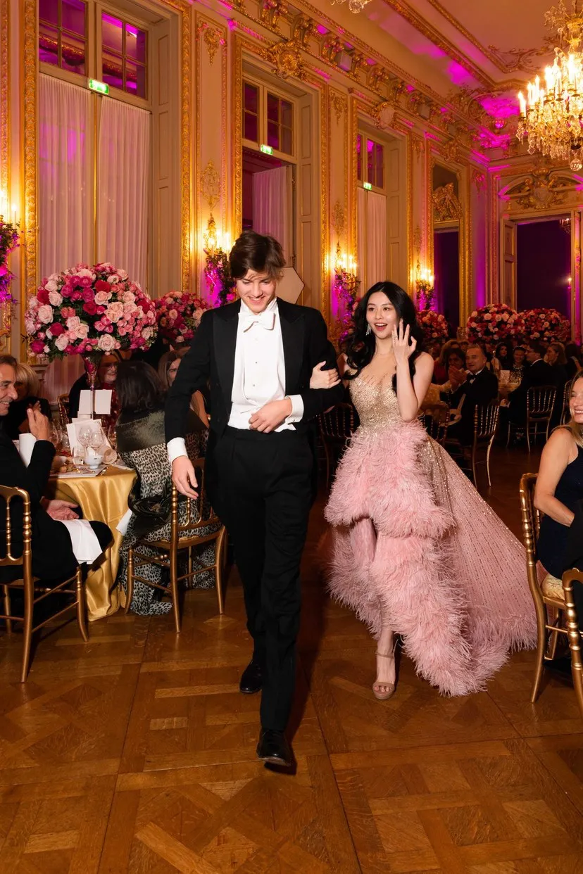 Yuet Sham in Georges Hobeika dress with her cavalier, Le Bal 2019