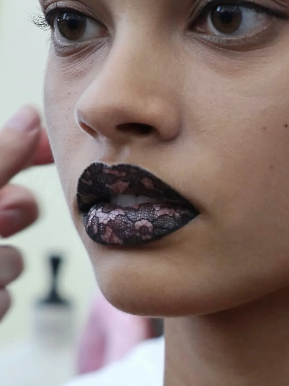 Haute Couture Fall 2026 Makeup Lace-textured lips by Thomas de Kluyver for the Jean Paul Gaultier Fall/Winter 2026 Haute Couture collection