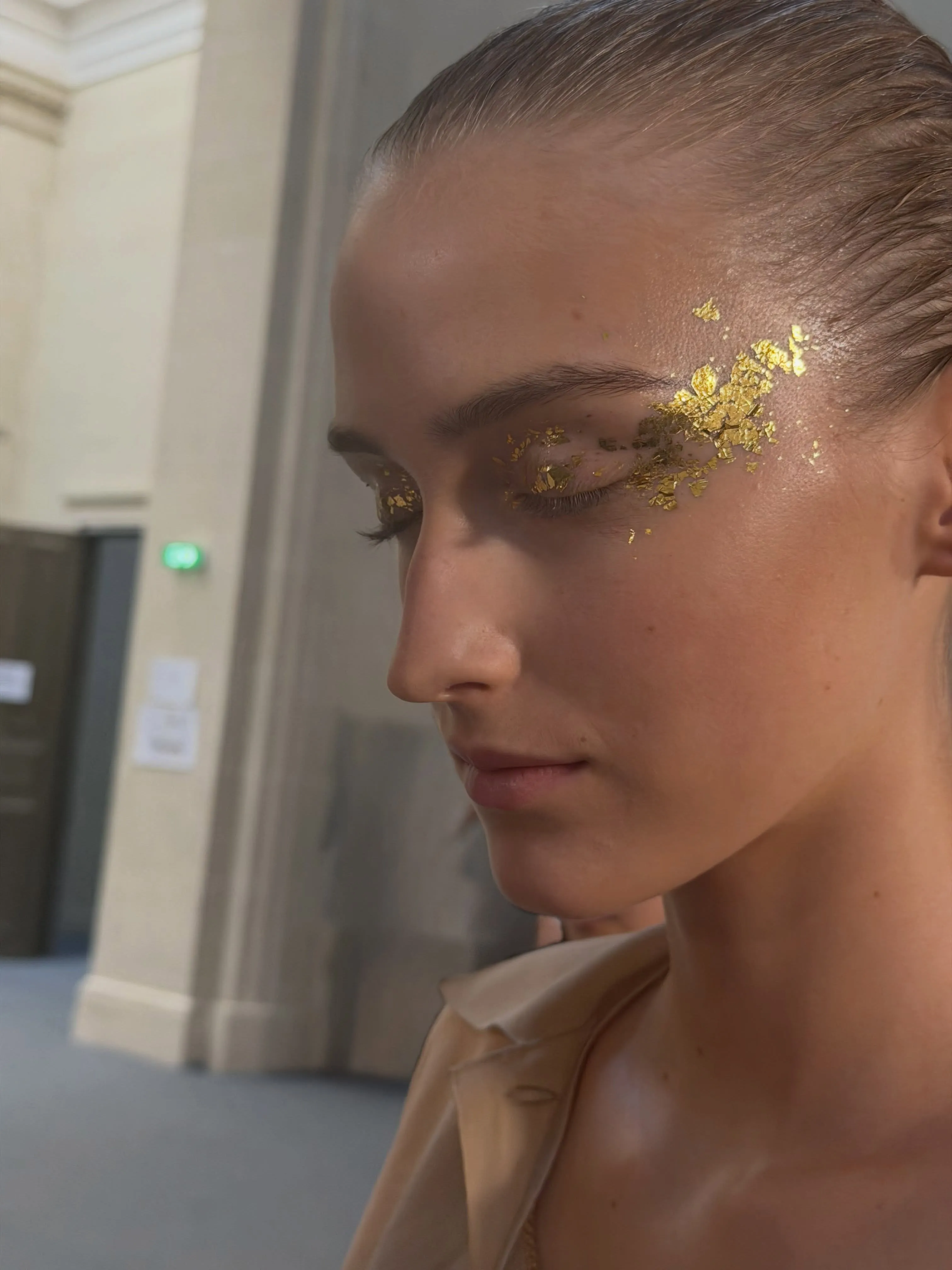 Haute Couture Fall 2026 Makeup Gold Leaf Eye Embellishment by Lucia Pieroni for the Chanel Fall/Winter 2026 Haute Couture runway show