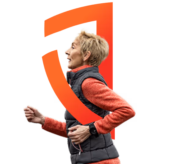 Middle-aged woman jogging, wearing a black vest over an orange long-sleeve shirt, with a fitness watch on her wrist, set against an orange abstract shape.