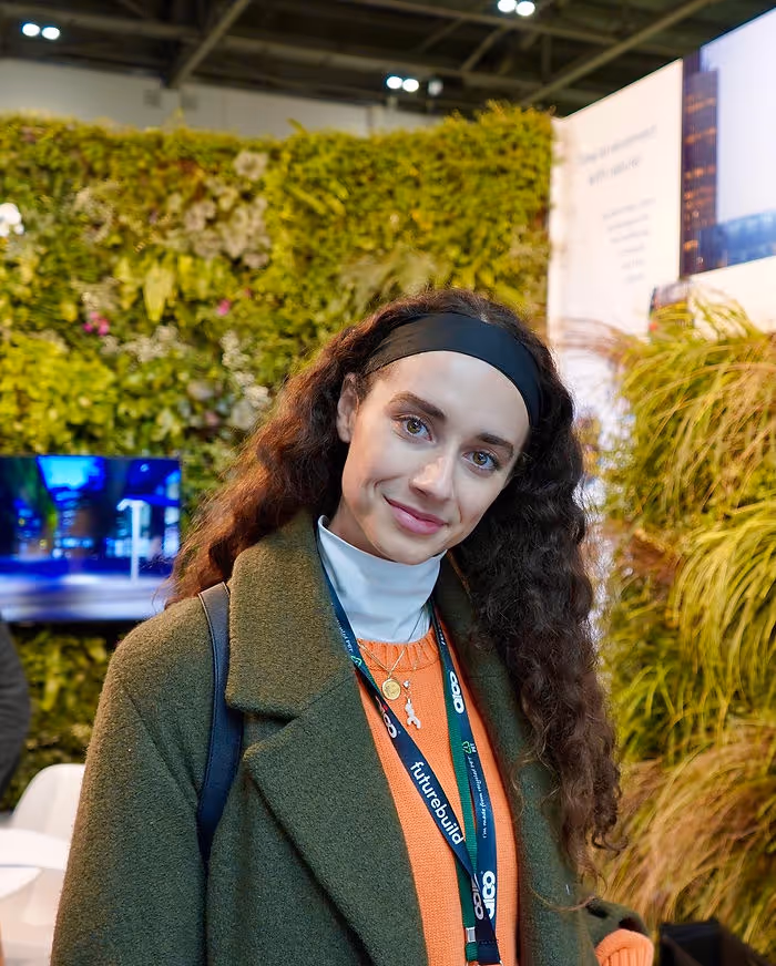 woman smiling at sustainability event