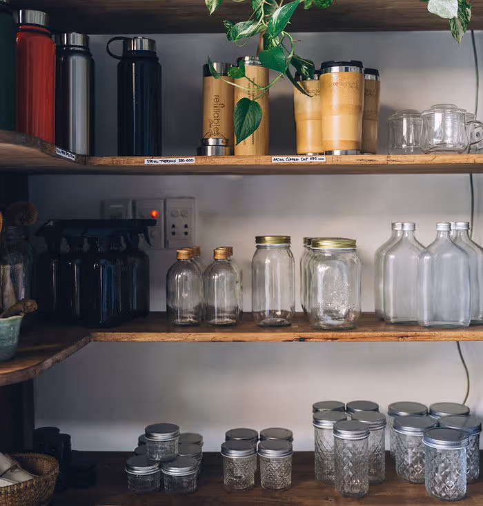 shelves covered in glass jars
