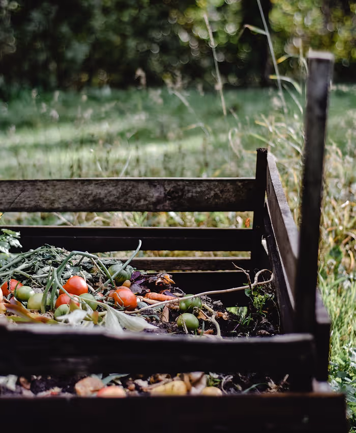organic compost pile in wooden box