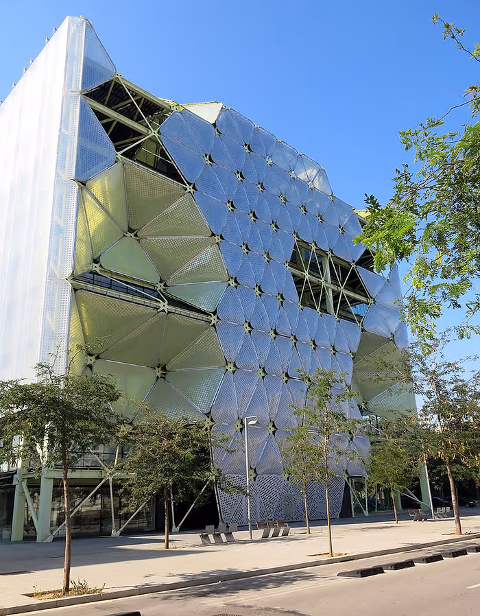 large modern building with eco-friendly features on outside