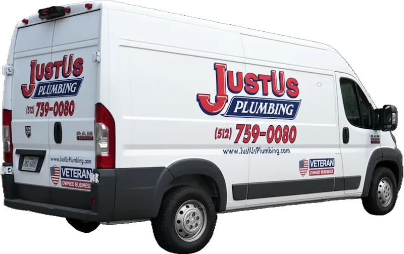 White service van with Just Us Plumbing logo, phone number, website, and Veteran owned business emblem.