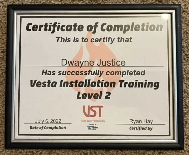 Certificate of Completion awarded to Dwayne Justice for successfully completing Vesta Installation Training Level 2 on July 6, 2022, certified by Ryan Hay from UST Vesta Smart Technology.