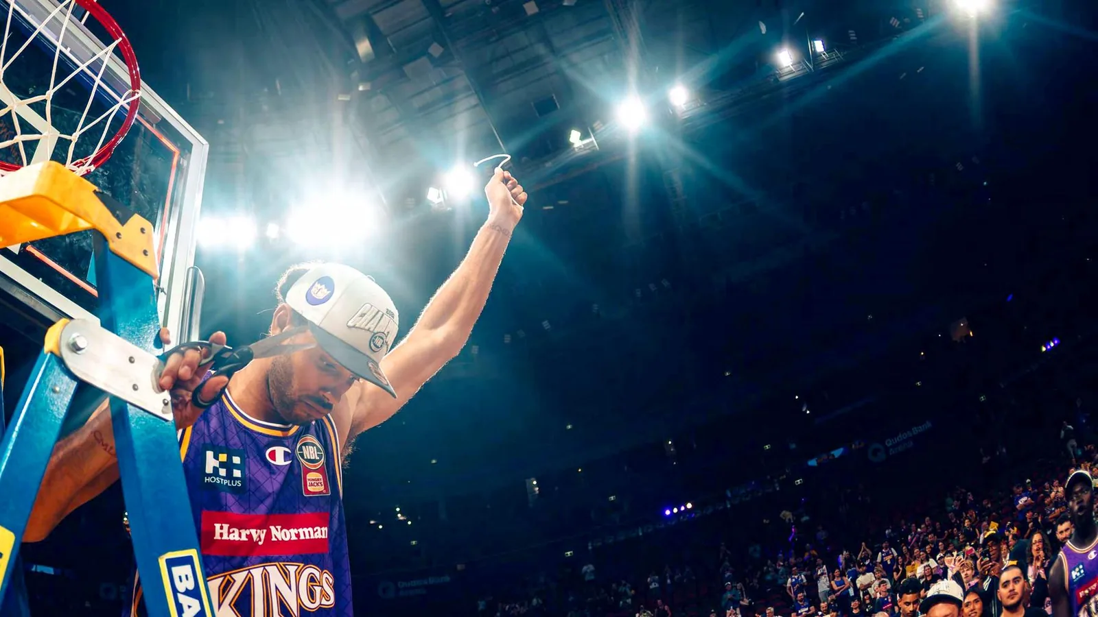 A Sydney Kings player celebrates in front of the home crowd